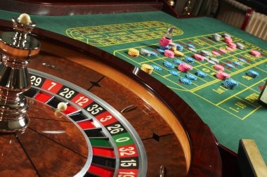 Blackjack table interface showing player hand, dealer hand, and decision buttons